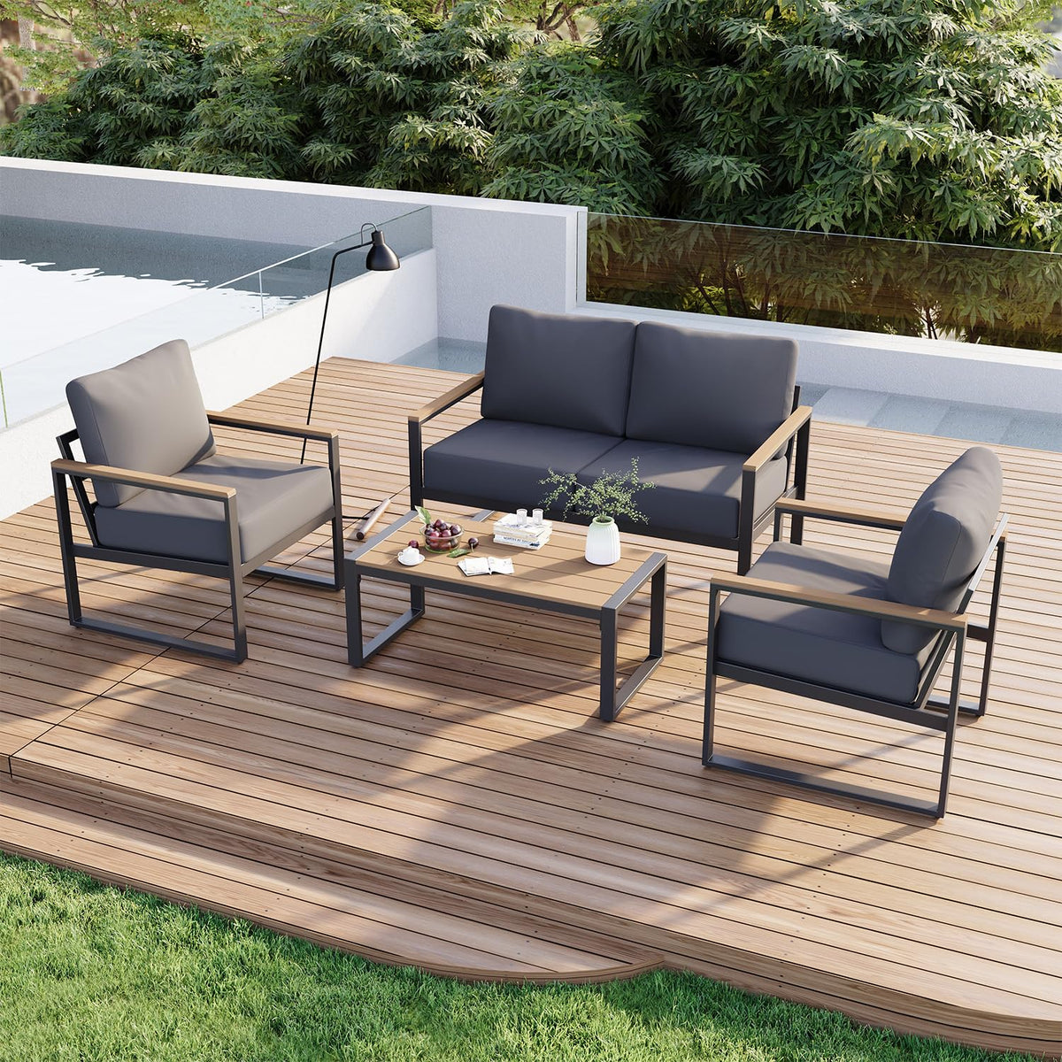 Aoxun 4-piece black metal patio set with dark gray cushions - photo 1